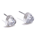 Heart-shaped crystal stud earrings on a white background